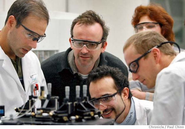 SFChronicle/Paul Chinn. From left, Brian Rabkin, project leader Phil Hugenholtz, Hector Garcia Martin, Falk Warnecke and Natalia Ivanova study the progress of an experiment in a cell sorter at the US Energy Department's Joint Genome Institute in Walnut Creek, Calif. on Friday, March 2, 2007. Scientists at the lab are attempting to extract enzymes from termites to break down wood and other plants into a cheaper form of ethanol. PAUL CHINN/The Chronicle **Brian Rabkin, Phil Hugenholtz, Hector Garcia Martin, Falk Warnecke, Natalia Ivanova
